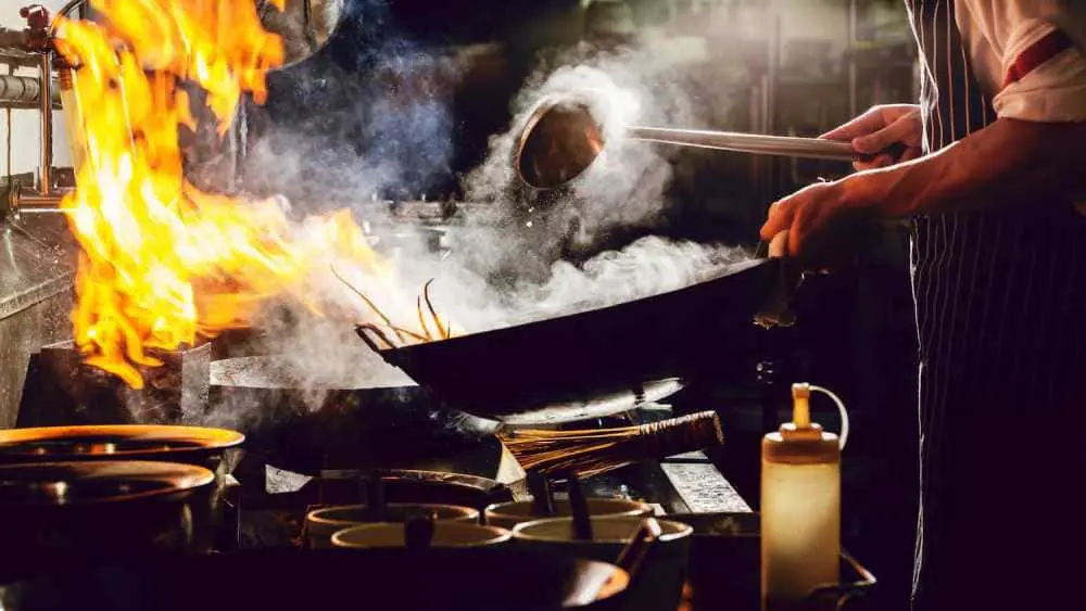 Chef preparing authentic Indian cuisine at SPICE ROOM
