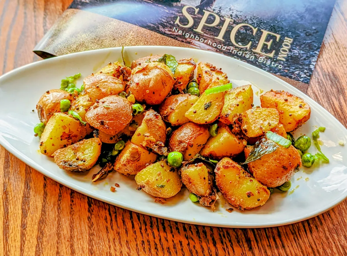 Potato & Green Peas Salad – Fresh potato and green peas salad tossed with mustard seeds, curry leaves, and spices | SPICE ROOM Denver