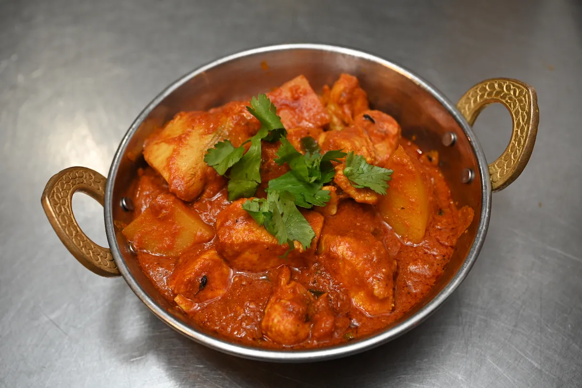 Chicken Vindaloo – Bold, fiery Goan curry with tender chicken and aromatic spices | SPICE ROOM Denver
