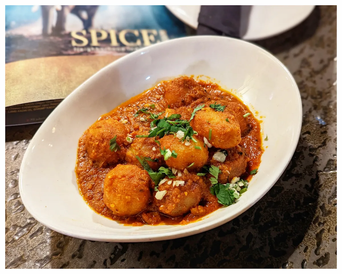 Bombay Aloo (Potato) – Bombay-style spiced potatoes slow-cooked in a rich tomato and onion gravy | SPICE ROOM Denver