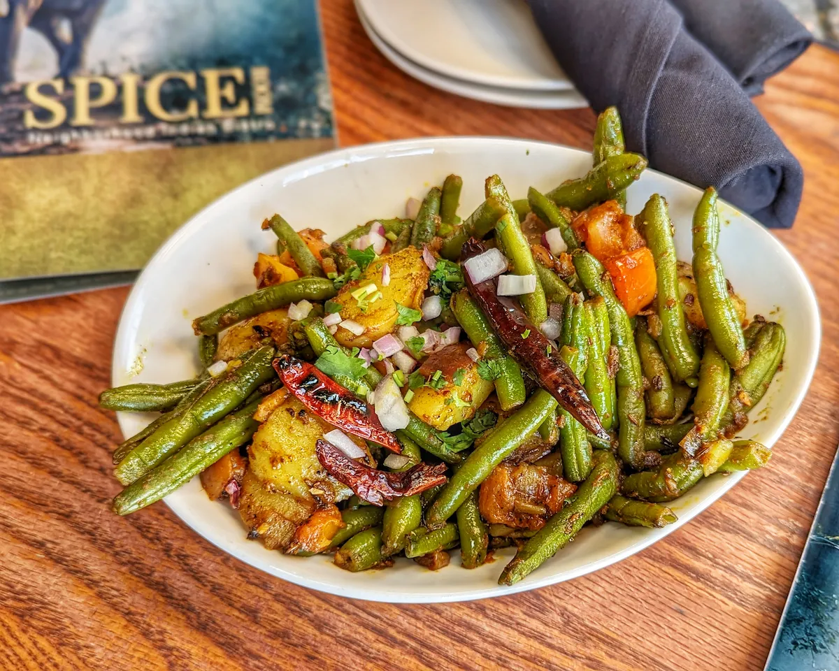 Green Bean Sabzi – Crispy stir-fried green beans and potato with mustard seeds and dried chili | SPICE ROOM Denver