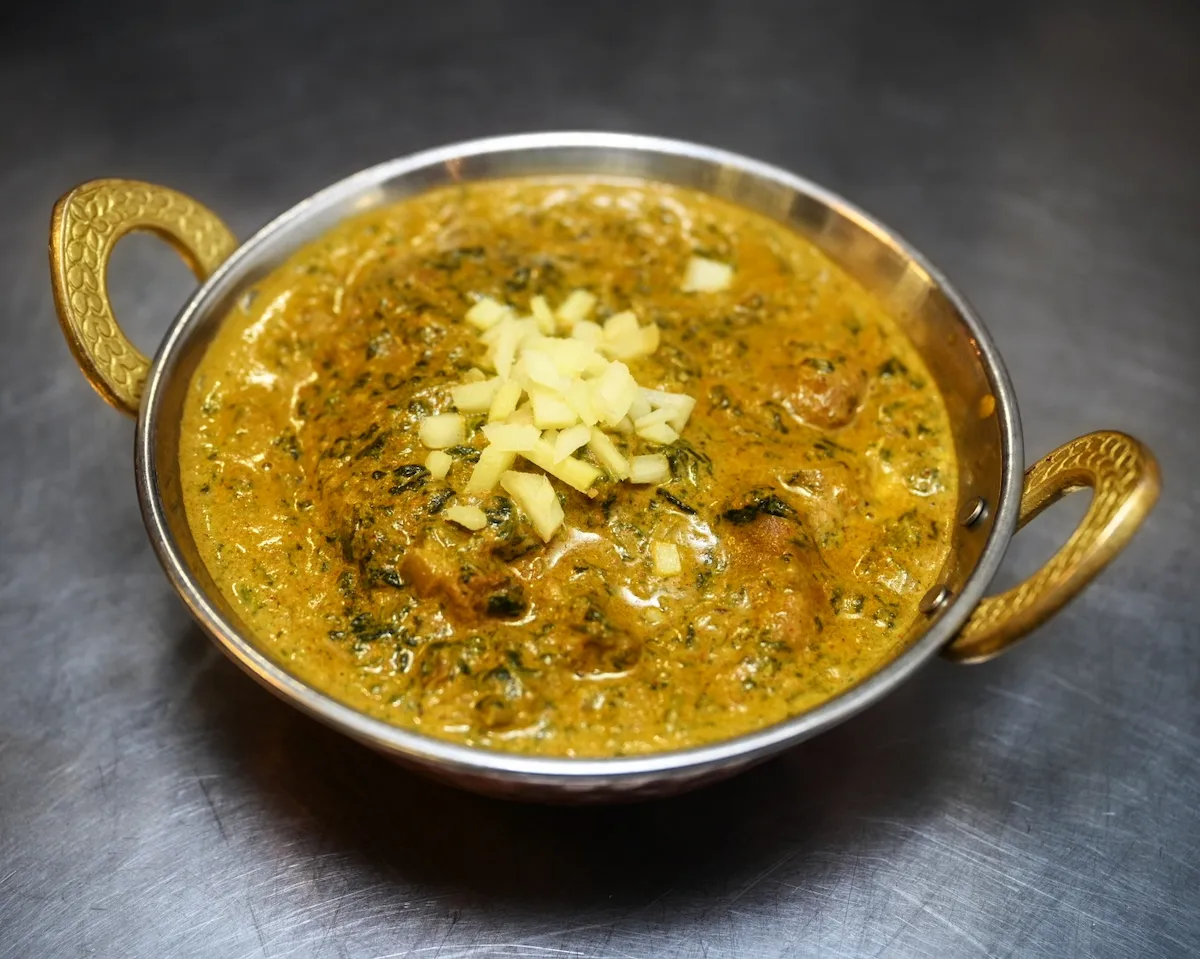 Lamb Palak – Slow-braised lamb in a velvety spinach and ginger sauce | SPICE ROOM Denver