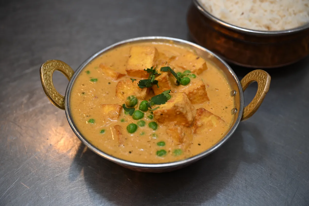 Mattar Paneer – Golden paneer and green peas in a lightly spiced, creamy golden sauce | SPICE ROOM Denver