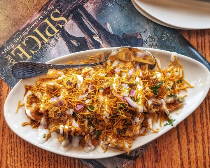 Dahi Papari — Crispy papdi wafers topped with potatoes, chickpeas, yogurt,