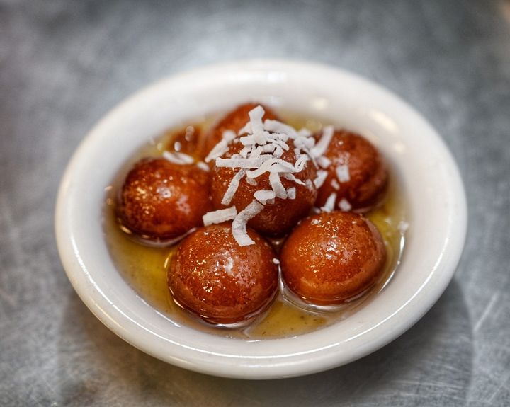 Gulab Jamun — Golden milk-dough spheres swimming in rose-cardamom syrup – 